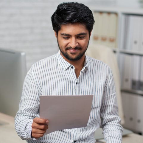 businessman-reading-document (1) (1)